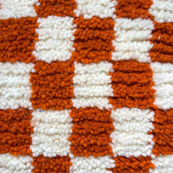 Handmade Moroccan wool pouf, colored orange and white - Image 2